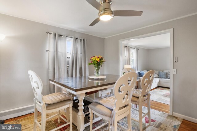 6 Shover Dr, Carlisle, PA 17013 - dining space with wood finished floors, a healthy amount of sunlight, baseboards, and ceiling fan