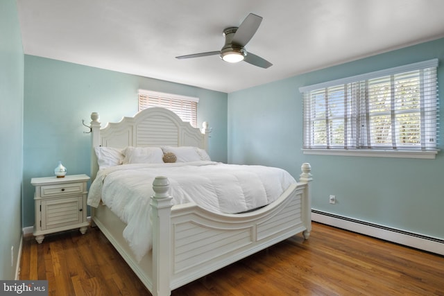 6 Shover Dr, Carlisle, PA 17013 - bedroom with baseboard heating, wood finished floors, and ceiling fan