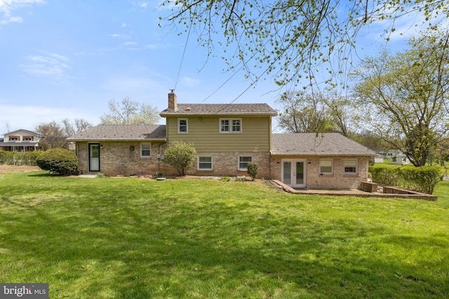 6 Shover Dr, Carlisle, PA 17013 - rear view of house featuring french doors, a chimney, brick siding, a yard, and a patio