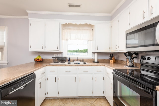 kitchen featuring a sink, ornamental molding, black appliances, and white cabinets