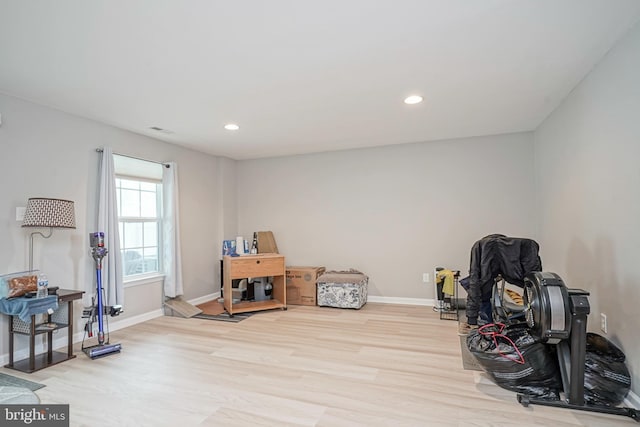 misc room featuring baseboards, recessed lighting, and wood finished floors