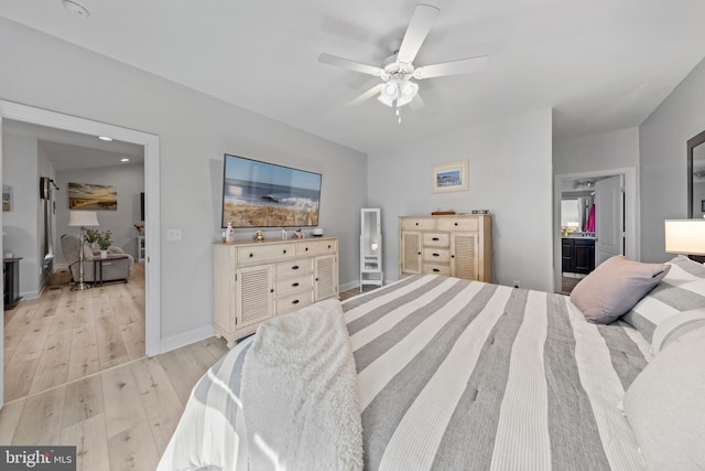 bedroom with recessed lighting, a ceiling fan, light wood-type flooring, baseboards, and ensuite bathroom