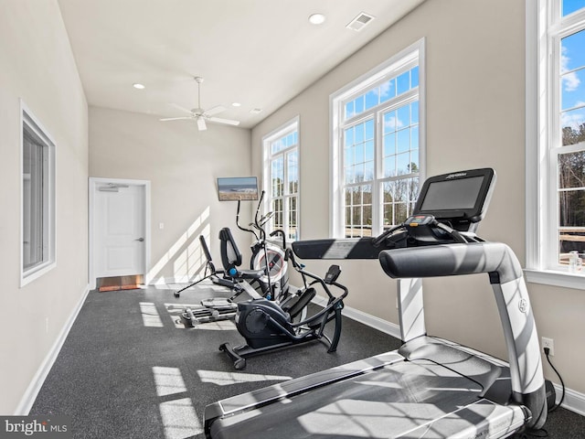 workout room featuring visible vents, a ceiling fan, baseboards, and recessed lighting