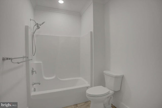 full bath with shower / washtub combination, baseboards, toilet, and marble finish floor