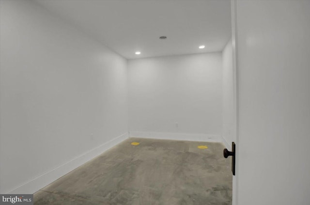 basement featuring baseboards and recessed lighting