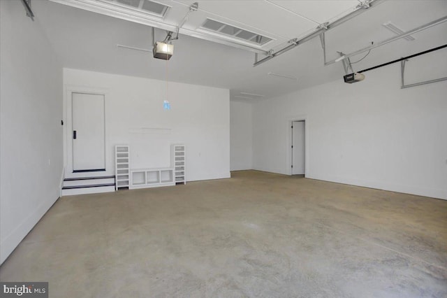 garage featuring a garage door opener