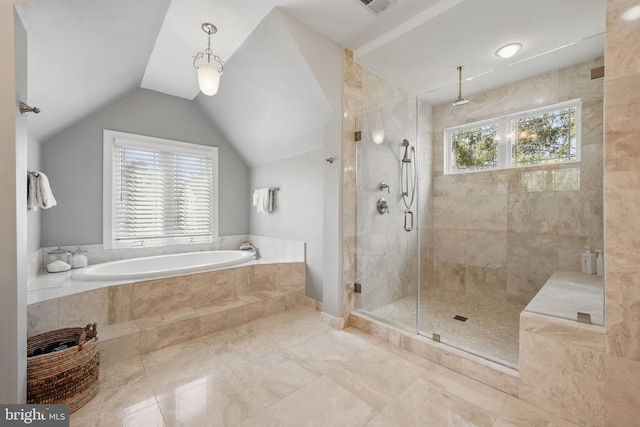 full bath featuring a stall shower, lofted ceiling, a bath, and a wealth of natural light