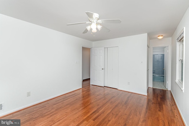 3108 Battersea Ln, Alexandria, VA 22309 - unfurnished bedroom featuring wood finished floors, baseboards, a closet, and a ceiling fan