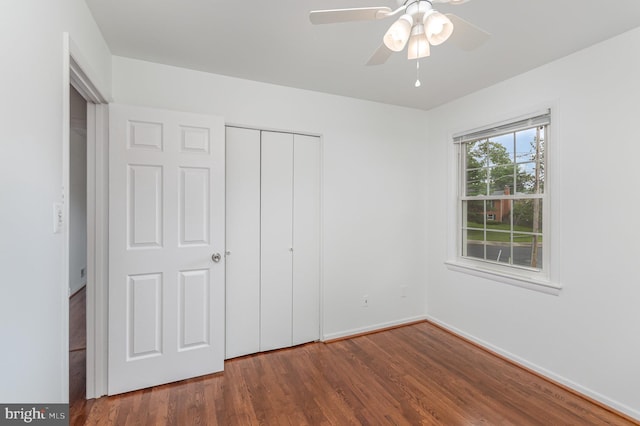 3108 Battersea Ln, Alexandria, VA 22309 - unfurnished bedroom with wood finished floors, a closet, baseboards, and ceiling fan