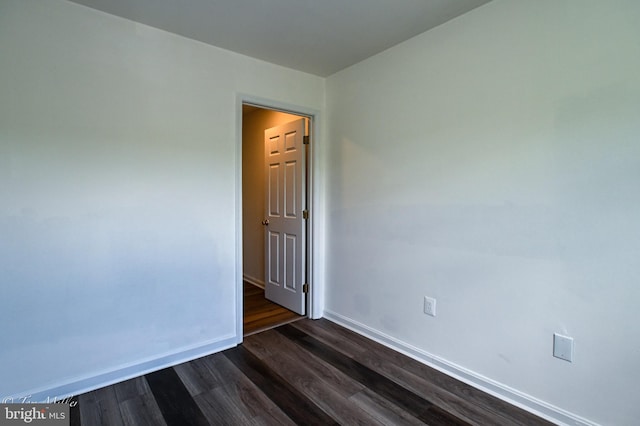 19142 Highstream Dr Unit 679, Germantown, MD 20874 - empty room with baseboards and dark wood-style floors