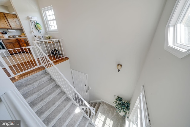 8818 Tanglewood Ln, Manassas, VA 20110 - stairs with a high ceiling