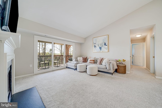 8818 Tanglewood Ln, Manassas, VA 20110 - living area with a fireplace with flush hearth, high vaulted ceiling, carpet floors, and baseboards