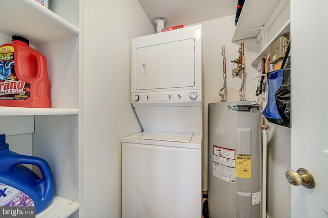 8818 Tanglewood Ln, Manassas, VA 20110 - laundry room with stacked washer and dryer, electric water heater, and laundry area