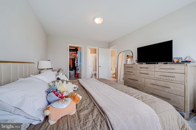 8818 Tanglewood Ln, Manassas, VA 20110 - bedroom with a walk in closet, ensuite bath, and a closet