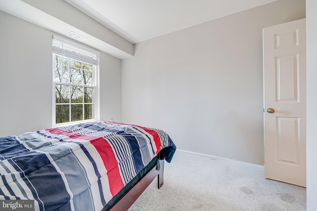 8818 Tanglewood Ln, Manassas, VA 20110 - bedroom featuring visible vents, carpet flooring, and baseboards