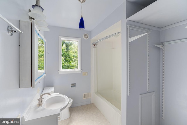 full bath featuring toilet, shower / tub combination, vanity, visible vents, and tile patterned floors