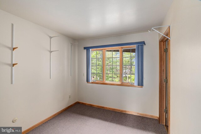 interior space featuring baseboards