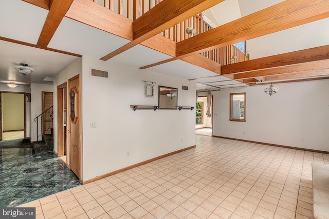 interior space featuring stairway, baseboards, visible vents, and tile patterned floors