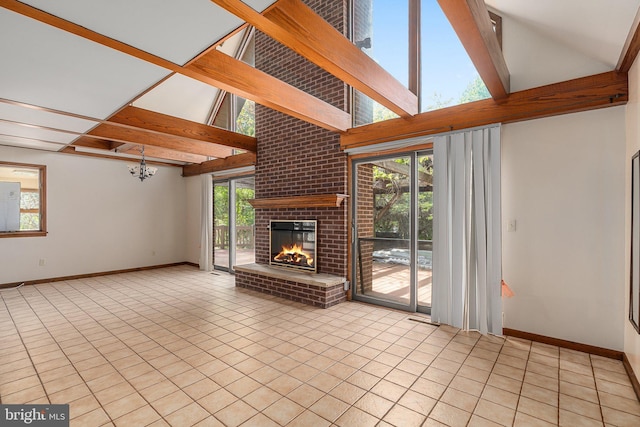 unfurnished living room with a fireplace, tile patterned flooring, an inviting chandelier, beamed ceiling, and baseboards