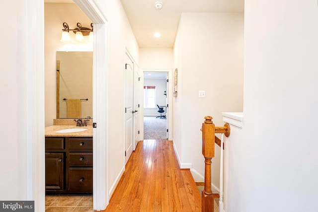 3571 Katherine Way, Frederick, MD 21704 - corridor featuring a sink, light wood-style flooring, and recessed lighting