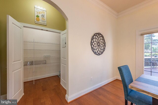 24129 Statesboro Pl, Ashburn, VA 20148 - interior space featuring arched walkways, ornamental molding, wood finished floors, and baseboards