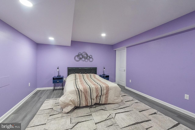 24129 Statesboro Pl, Ashburn, VA 20148 - bedroom featuring baseboards, wood finished floors, and recessed lighting