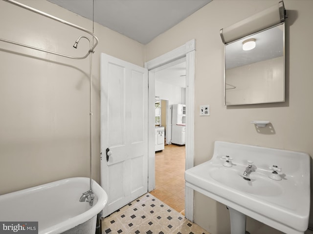113 Ingleside Ave, Baltimore, MD 21228 - bathroom featuring a freestanding tub and tile patterned floors
