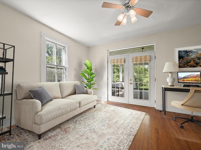 113 Ingleside Ave, Baltimore, MD 21228 - living room with french doors, healthy amount of natural light, hardwood / wood-style floors, and baseboards
