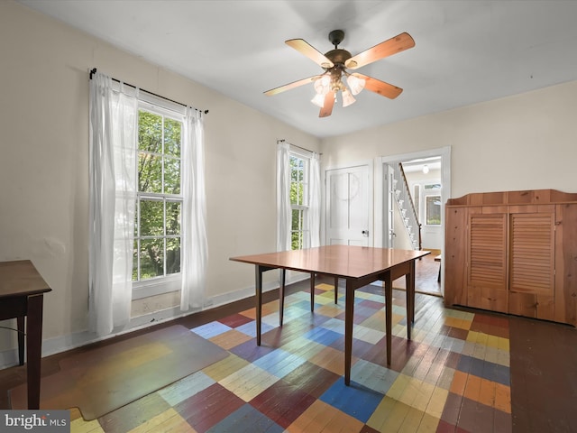 113 Ingleside Ave, Baltimore, MD 21228 - dining room featuring hardwood / wood-style floors, stairway, and ceiling fan