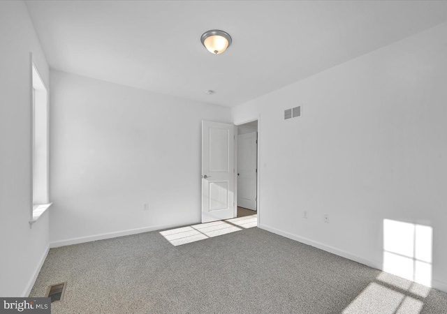 21 American Ave, Carlisle, PA 17013 - unfurnished bedroom featuring carpet floors, visible vents, and baseboards
