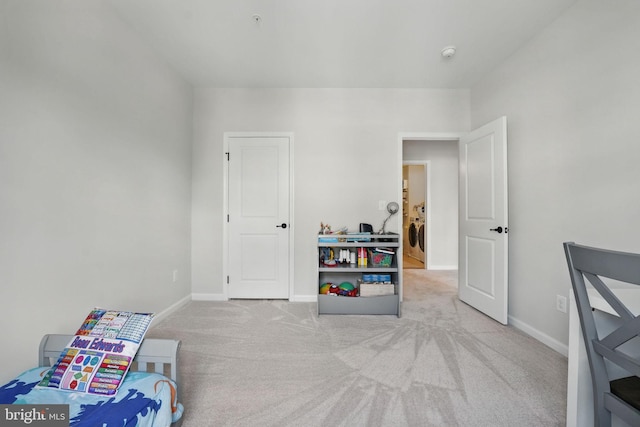 42250 Tackroom Ter, Aldie, VA 20105 - carpeted bedroom with washer / dryer and baseboards