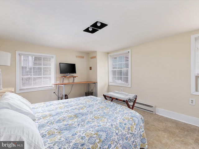 bedroom featuring baseboards