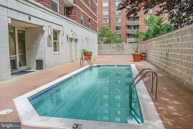 880 N Pollard St Unit 1021, Arlington, VA 22203 - community pool featuring a patio area
