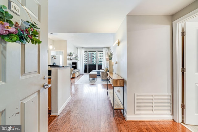 880 N Pollard St Unit 1021, Arlington, VA 22203 - hall featuring wood finished floors