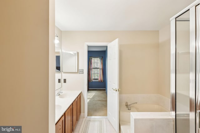 9 Stratton Ct, Robbinsville, NJ 08691 - full bathroom featuring a bath, tile patterned floors, a sink, double vanity, and a stall shower