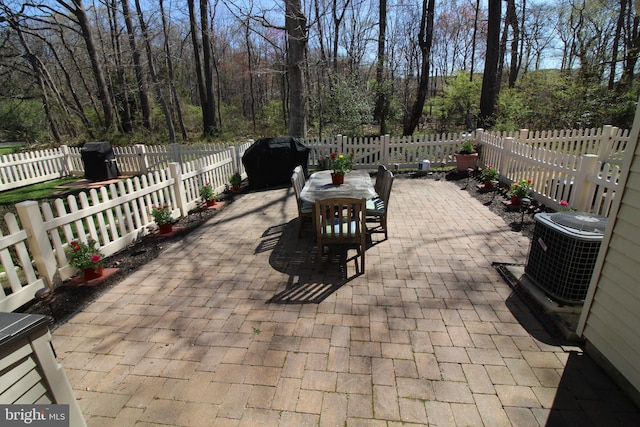 9 Stratton Ct, Robbinsville, NJ 08691 - view of patio / terrace with cooling unit, outdoor dining space, and fence private yard