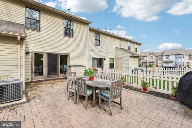 9 Stratton Ct, Robbinsville, NJ 08691 - back of house featuring cooling unit, a residential view, a patio, and fence