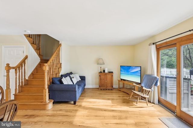 9 Stratton Ct, Robbinsville, NJ 08691 - sitting room with wood finished floors, baseboards, and stairway