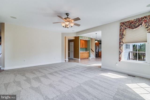 1005 Chaff Way, La Plata, MD 20646 - interior space with visible vents, ceiling fan, light carpet, and baseboards