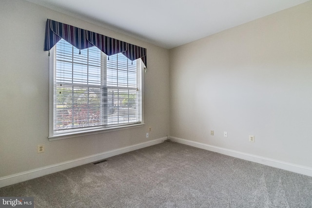 1005 Chaff Way, La Plata, MD 20646 - carpeted empty room featuring baseboards, visible vents, and a healthy amount of sunlight