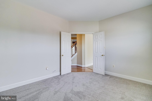 1005 Chaff Way, La Plata, MD 20646 - unfurnished room with carpet flooring, stairs, and baseboards