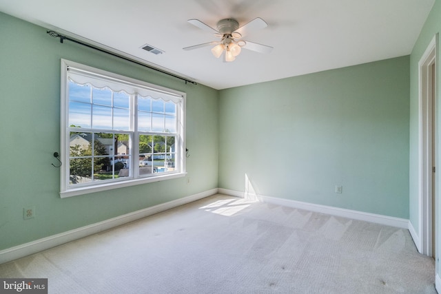 1005 Chaff Way, La Plata, MD 20646 - carpeted spare room with a ceiling fan, visible vents, and baseboards