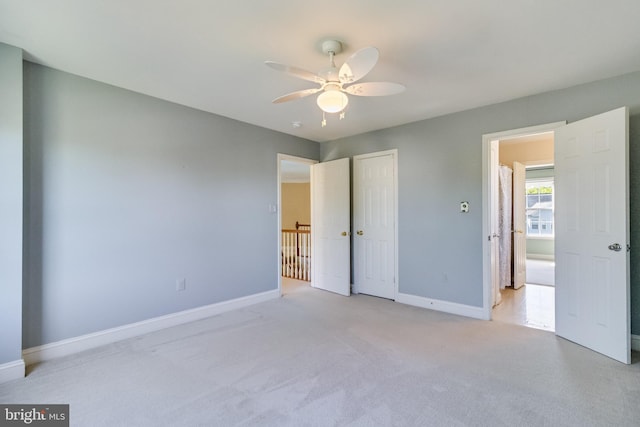 1005 Chaff Way, La Plata, MD 20646 - unfurnished bedroom featuring baseboards, light carpet, a closet, and ceiling fan
