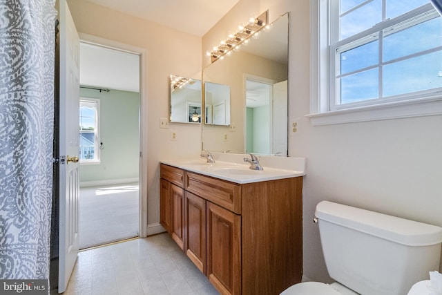 1005 Chaff Way, La Plata, MD 20646 - full bathroom with toilet, plenty of natural light, and a sink