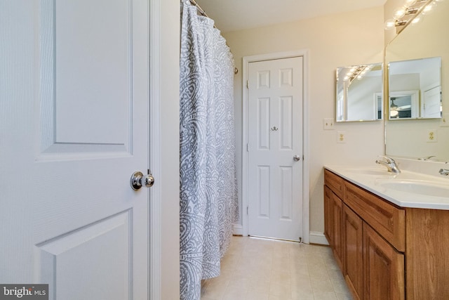 1005 Chaff Way, La Plata, MD 20646 - bathroom with tile patterned floors, double vanity, and a sink