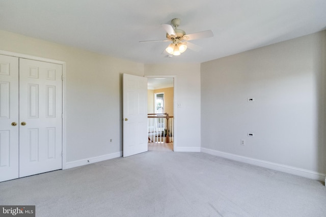 1005 Chaff Way, La Plata, MD 20646 - unfurnished bedroom with baseboards, ceiling fan, a closet, and carpet