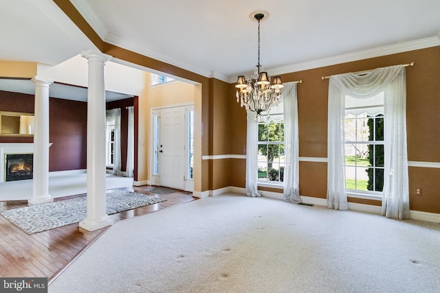1005 Chaff Way, La Plata, MD 20646 - unfurnished dining area featuring crown molding, ornate columns, and plenty of natural light