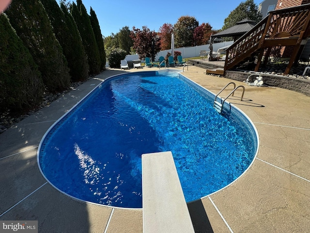 1005 Chaff Way, La Plata, MD 20646 - view of swimming pool featuring a patio area, a diving board, a fenced in pool, a gazebo, and fence