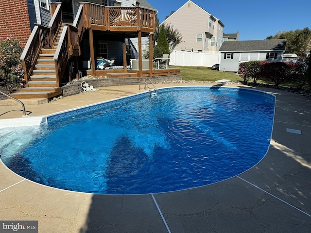 1005 Chaff Way, La Plata, MD 20646 - view of pool with a patio, stairway, a diving board, a fenced in pool, and a deck