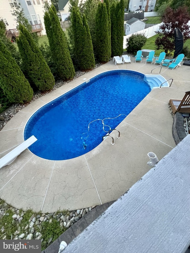 1005 Chaff Way, La Plata, MD 20646 - outdoor pool featuring a diving board and a patio